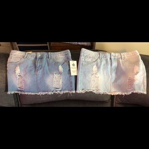 Women’s jean skirts, darker & lighter pair